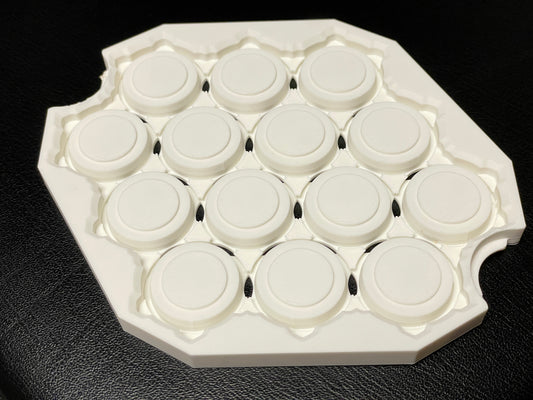 white 3d printed bottle cap coaster without any bottle caps